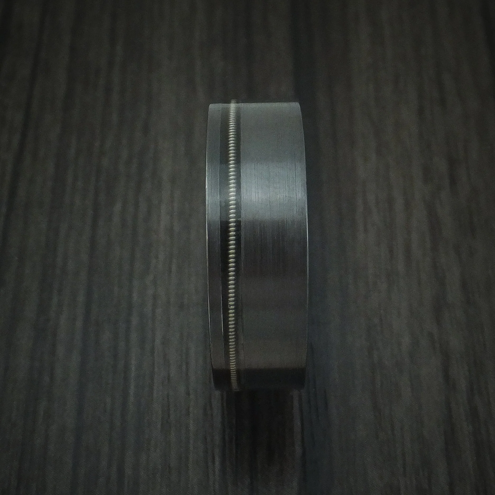 Black Titanium or Black Zirconium Custom Men's Ring with a Guitar String Inlay and Whiskey Barrel Hardwood Sleeve - Image 3