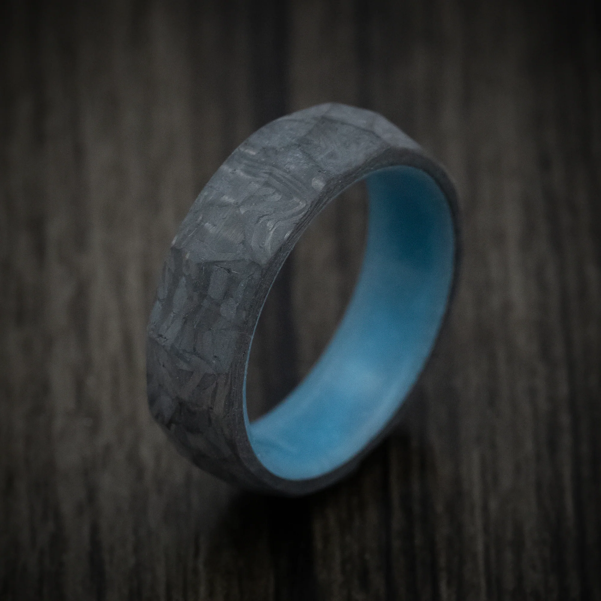 Faceted Carbon Fiber Men's Ring with Blue Glow Sleeve - Image 3