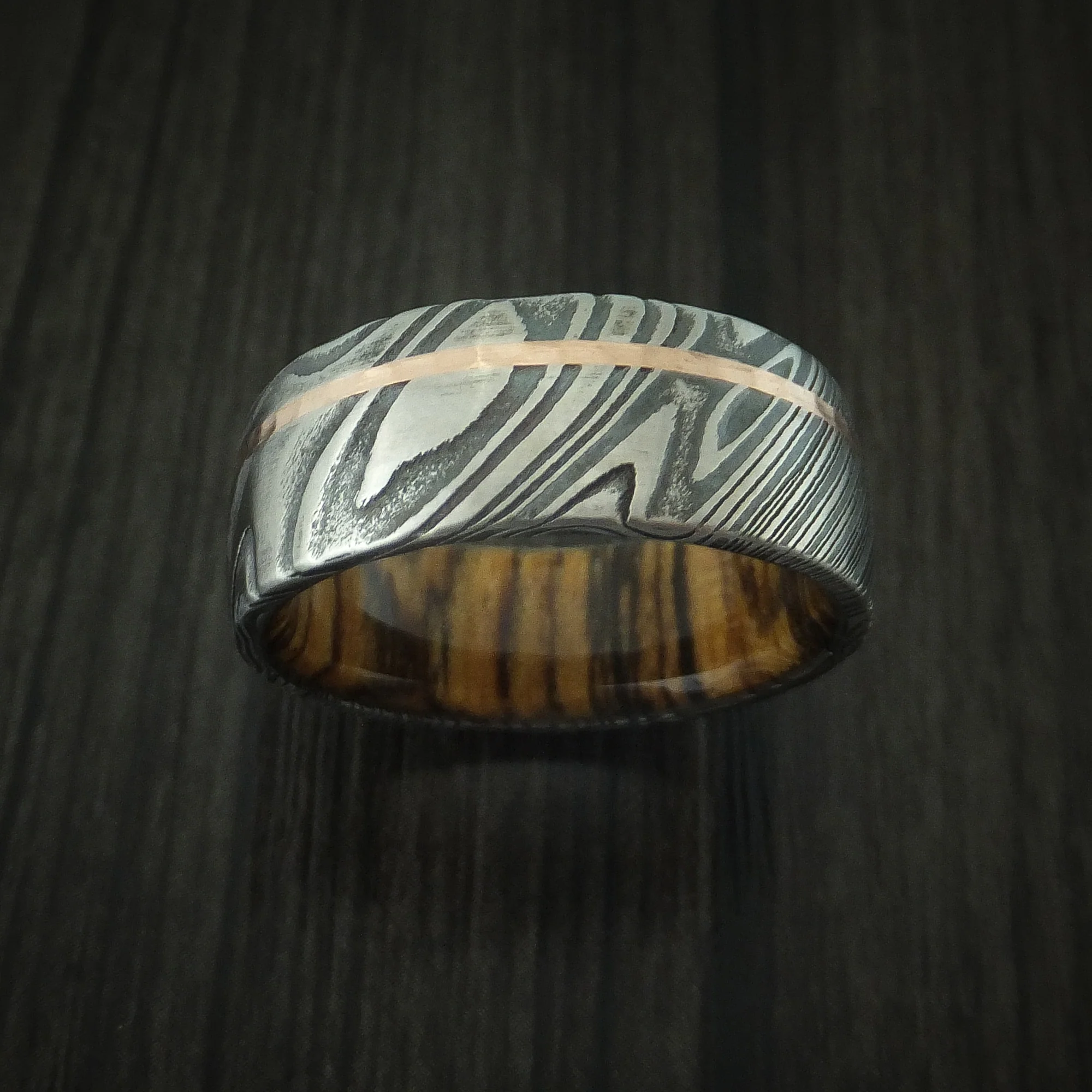 Woodgrain Kuro Damascus Steel Men's Ring with 14K Rose Gold Inlay and Bocote Hardwood Sleeve Custom Made Wood Band - Image 2