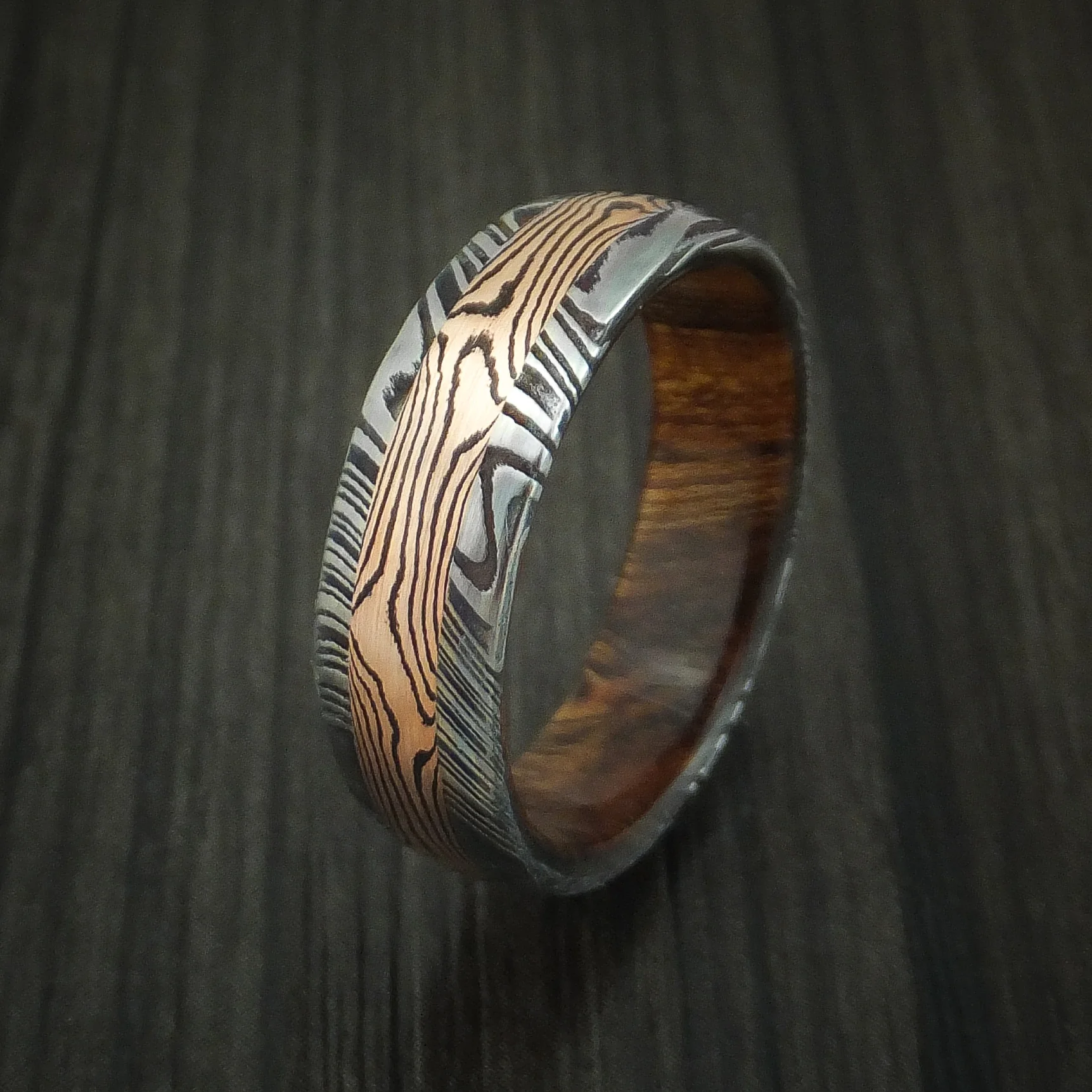 Woodgrain Kuro Damascus Steel Men's Ring with 14K Rose Gold Mokume Shakudo Inlay and Desert Ironwood Burl Wood Sleeve Custom Made Band - Image 4