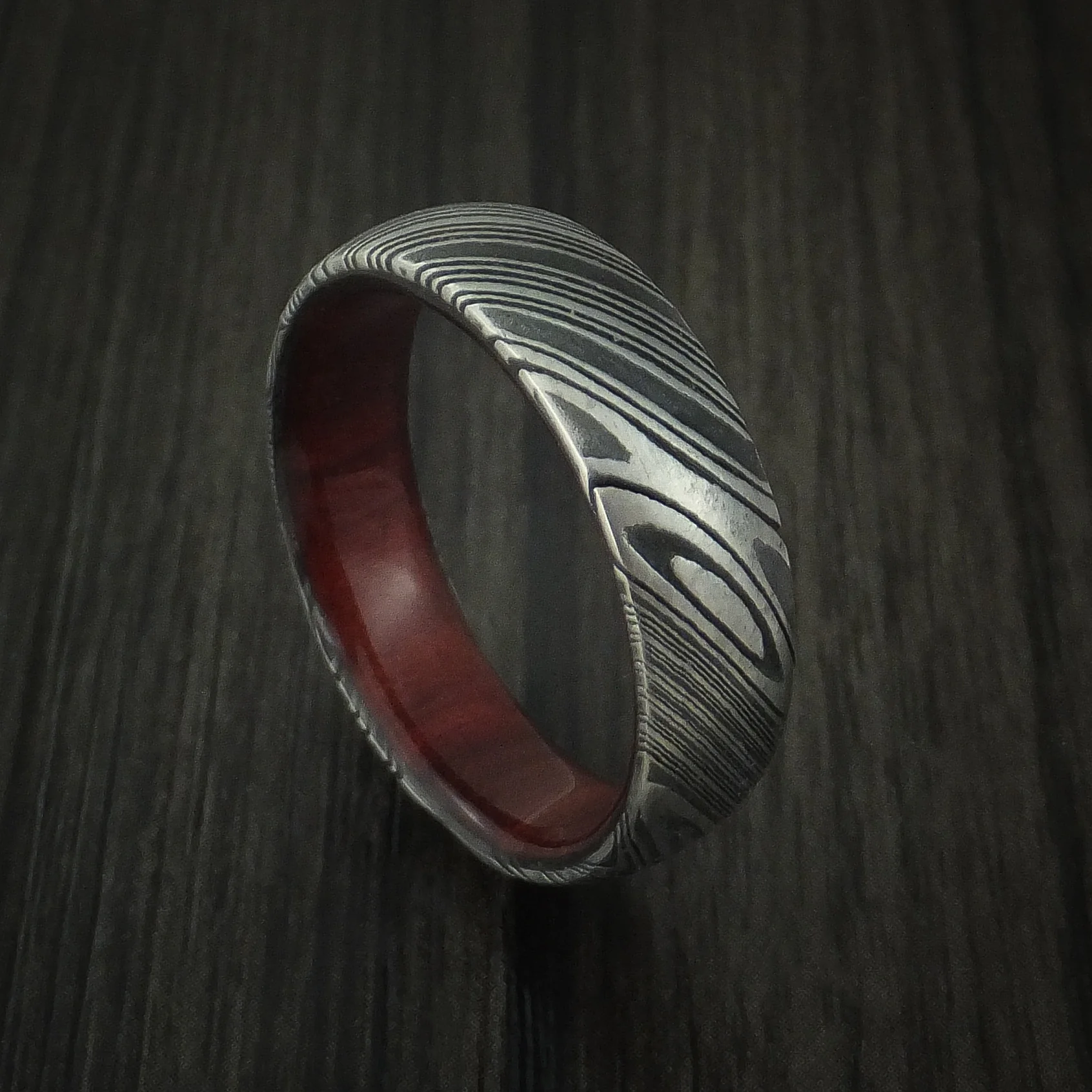 Woodgrain Kuro Damascus Steel Men's Ring with Red Heart Wood Hardwood Sleeve Custom Made Wood Band
