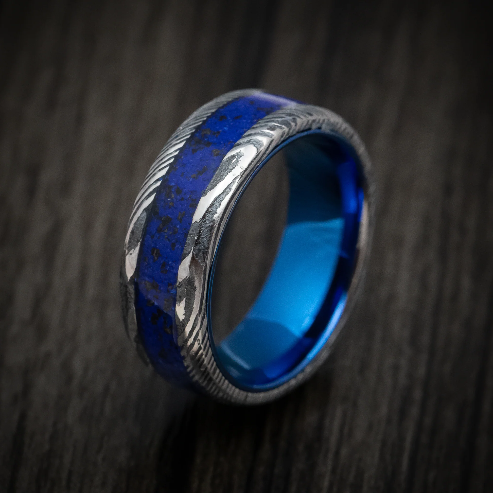 Woodgrain Kuro Damascus Steel with Anodized Sleeve and Custom Dinosaur Bone and Stone Inlay - Image 4